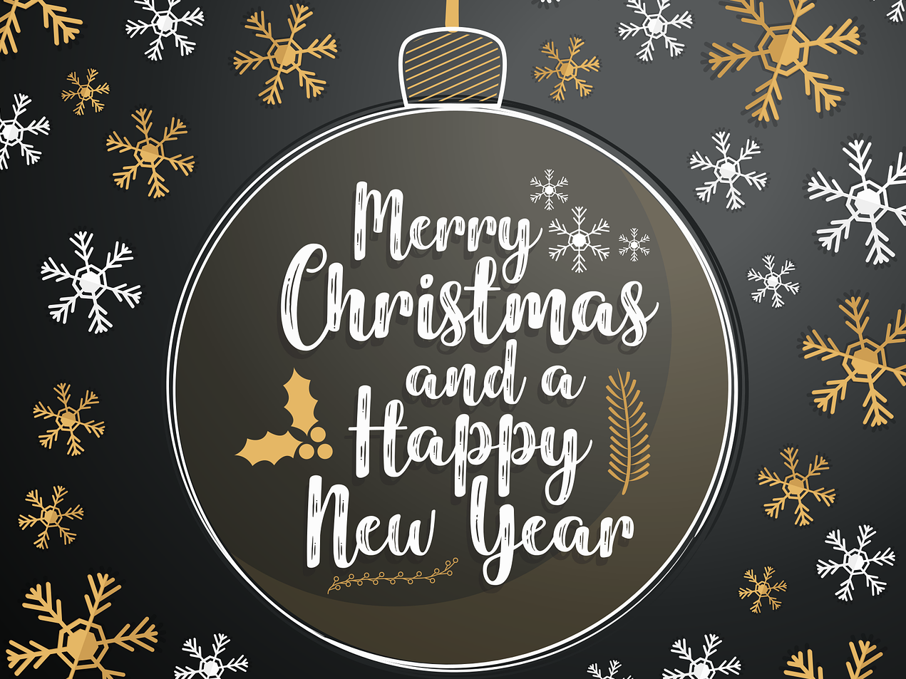 Kugel mit dem Text "Frohe Weihnachten und ein glückliches neues Jahr" umgeben von Schneeflocken.